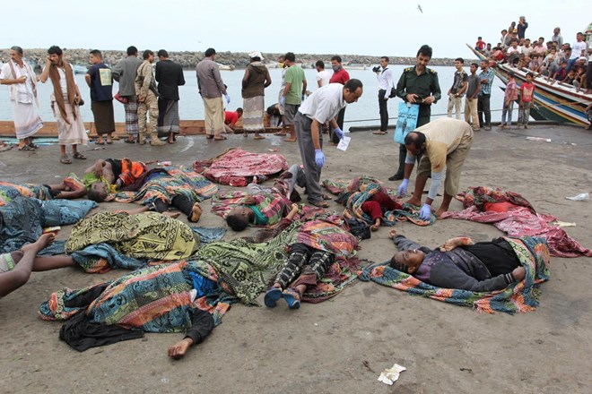 Yemeni police check the bodies of Somali refugees killed in an attack by a helicopter while traveling in a vessel off Yemen, at the Red Sea port of Hodeidah on March 17. Ryan Goodman writes that it will take time to sort out what exactly occurred, but this attack comes just as the White House is considering increasing its involvement in the Saudi-led operations against the Iranian-back Houthi militia in this Middle East nation.